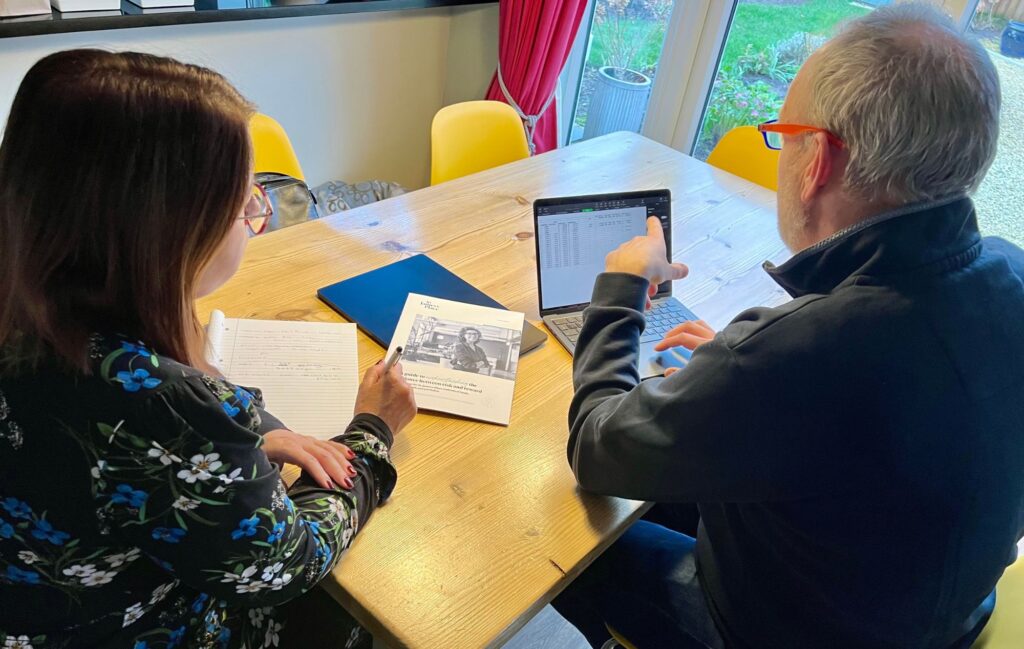 Image of Gemma Darcy advising a client on his company pension