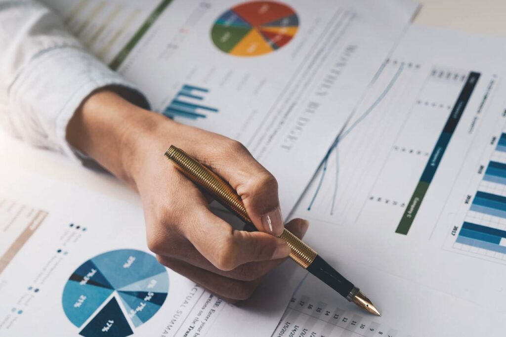 Financial adviser explaining investment illustrated information.