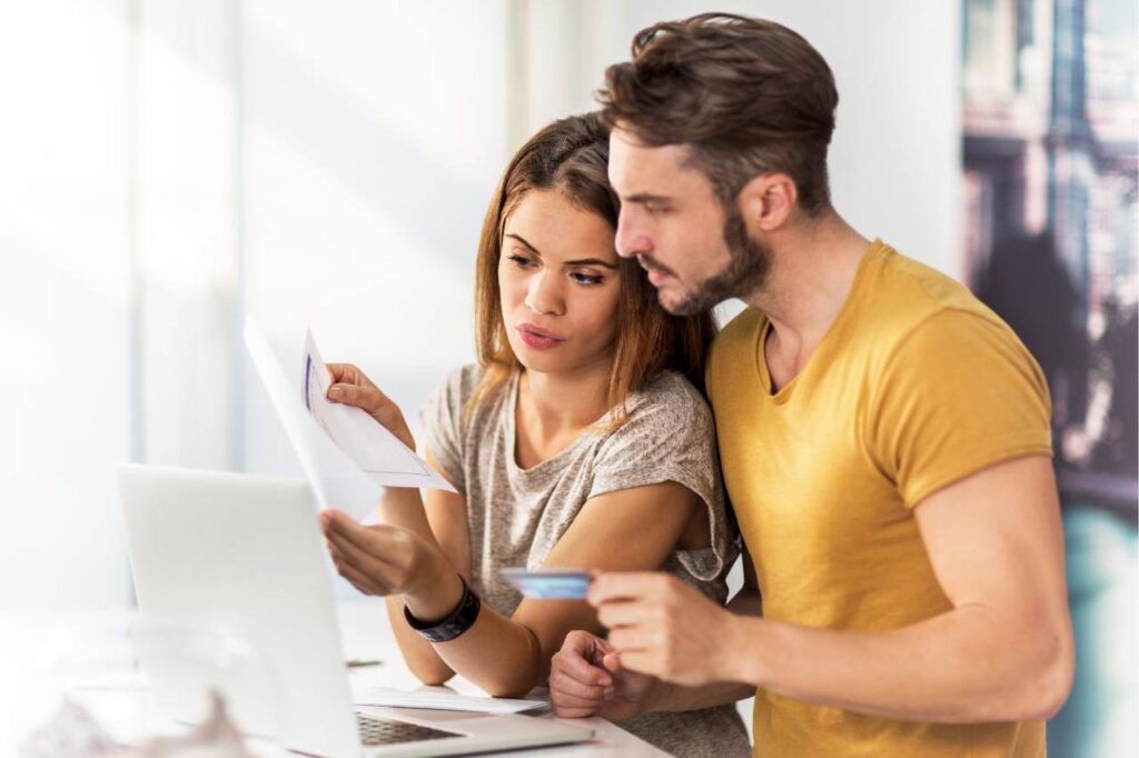 Couple working through their finances together